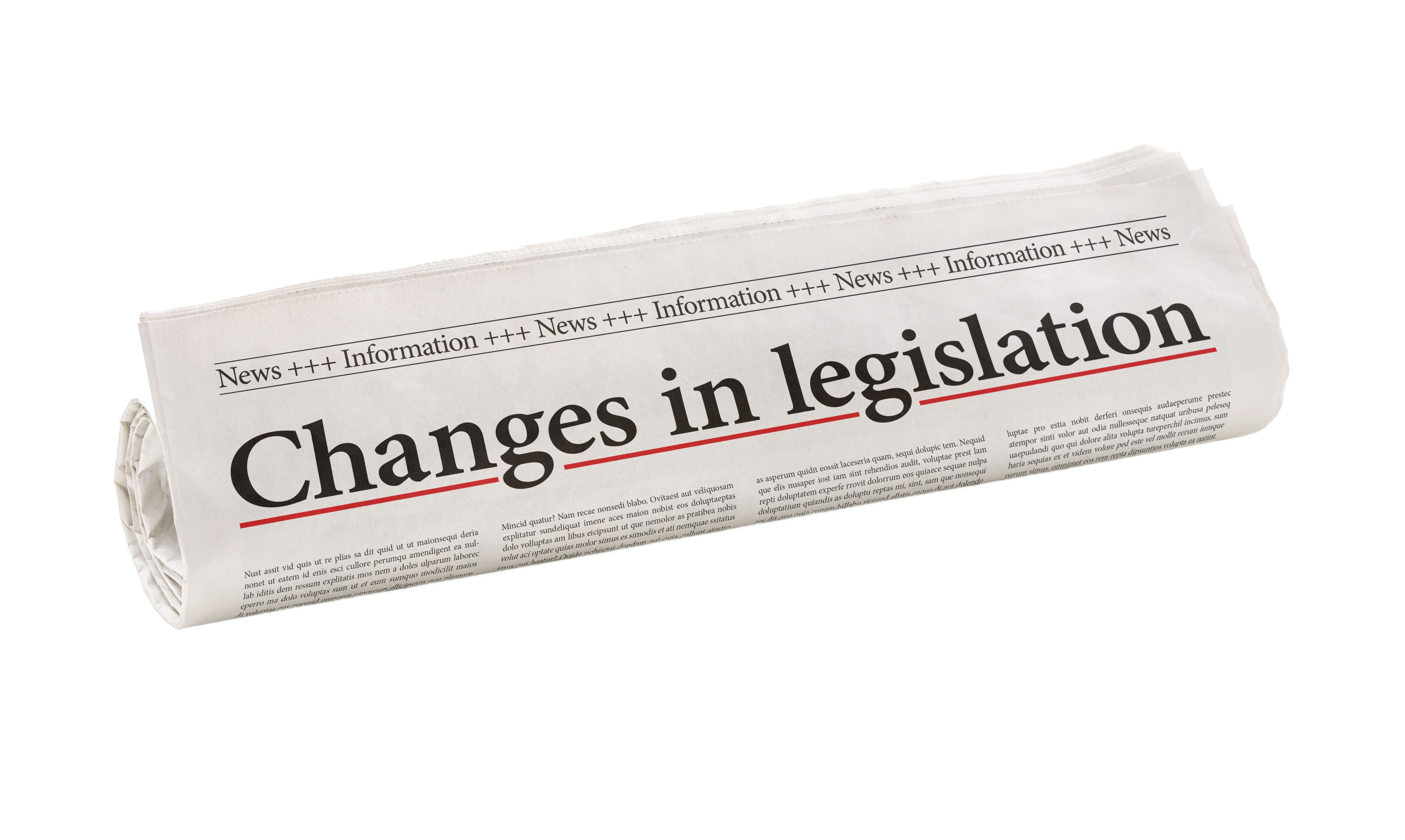 Rolled up newspaper with 'Changes in legislation' text on it